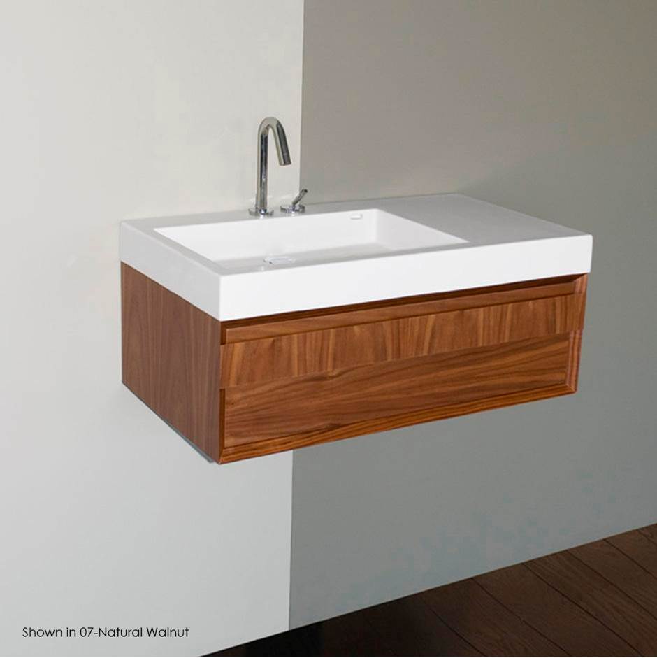 Lacava Wall-mount under-counter vanity with finger pulls on one drawer, the drawer has Ushaped notch for plumbing.