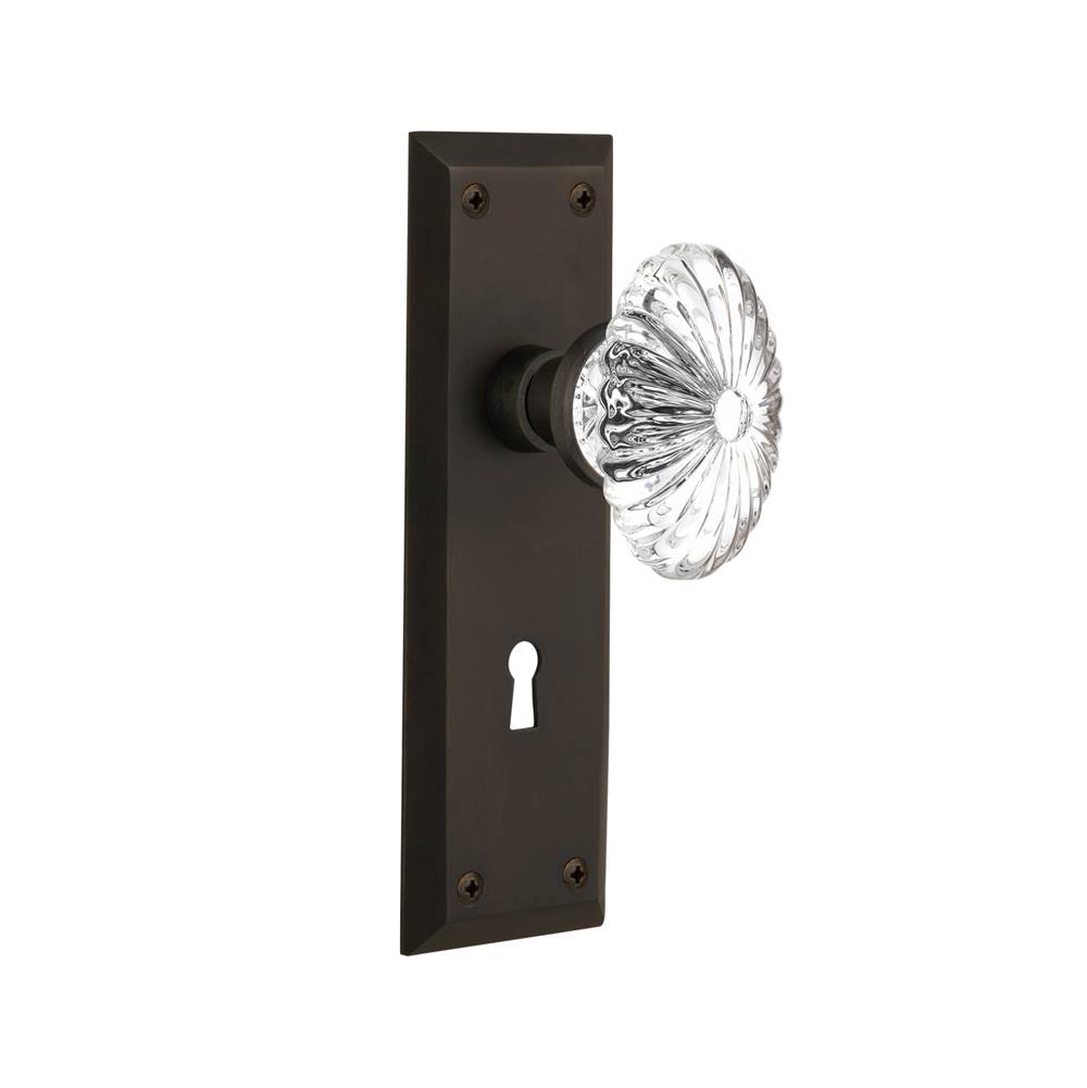 Nostalgic Warehouse Nostalgic Warehouse New York Plate with Keyhole Passage Oval Fluted Crystal Glass Door Knob in Oil-Rubbed Bronze